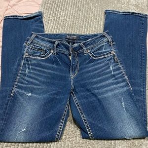 Silver denim jeans- Suki mid rise slim boot cut